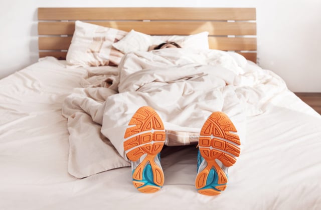 running out of time to exercise running shoes in bed.jpg